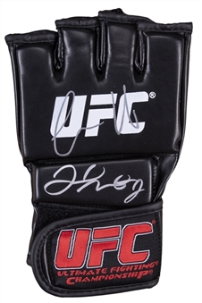 Floyd Mayweather & Conor McGregor Dual Signed UFC Glove (Beckett)